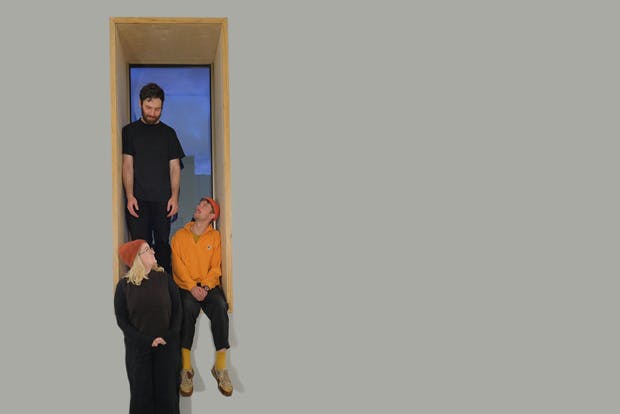 Contemporary music duo flxnflx and composer James M Creed in doorway