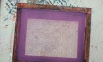 A pattern printed onto a surface with a purple background