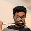 Arjun Jethwa playing the flute