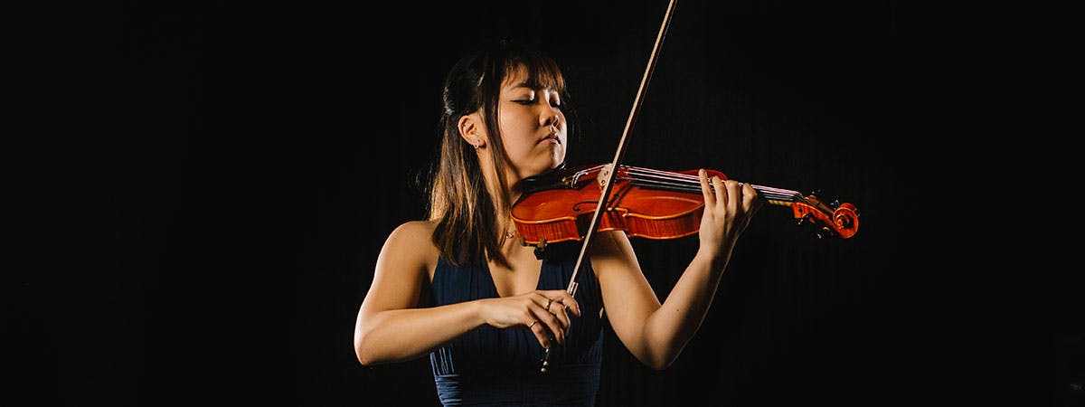 A student playing the violin