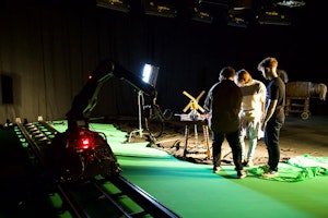 Students using film studio set