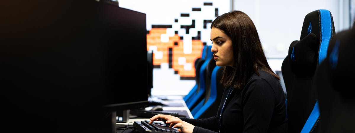 video games student using software to develop game 