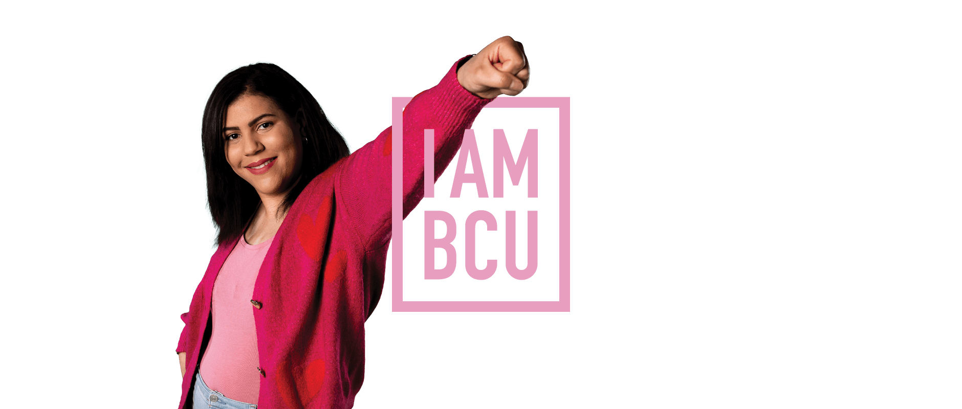 Kimberly punches through the I am BCU logo