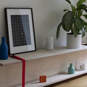 A shelf for a living room