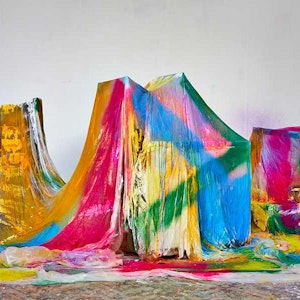 Fine Art installation: blocks covered in sheets spray painted in bright colours