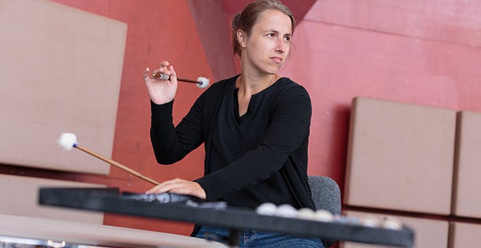 Iris van den Bos playing percussion instrument