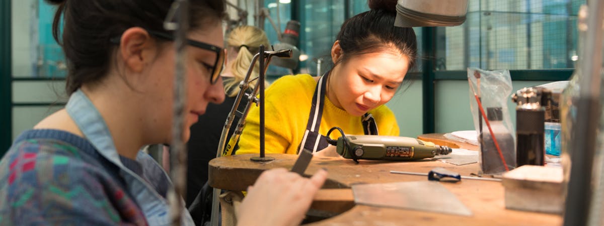 Jewellery students working at a bench