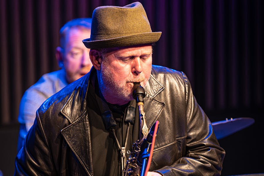 John O'Gallagher playing the saxophone