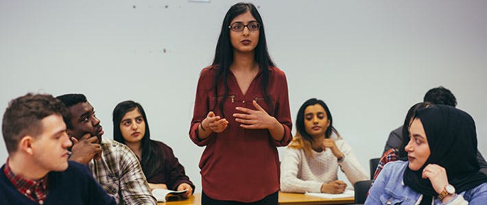 Law School - 10 Reasons Why Image 710x299 - woman speaking in a classroom