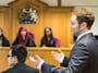 Law student in mock courtroom