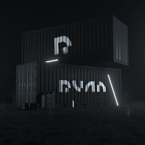 Graphic design student work - Two black shipping containers stacked in the dark with lettering on the side