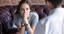 Female student receiving mental health guidance