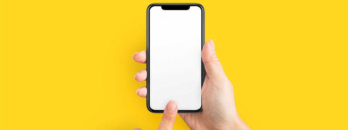 A person holding an iPhone
