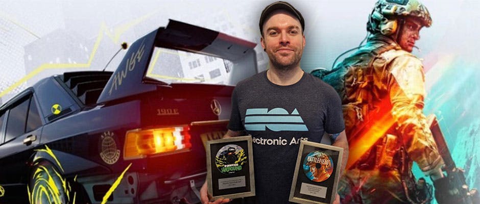 Nathan holding two trophies in front of a background featuring imagery from Unbound and Battlefield