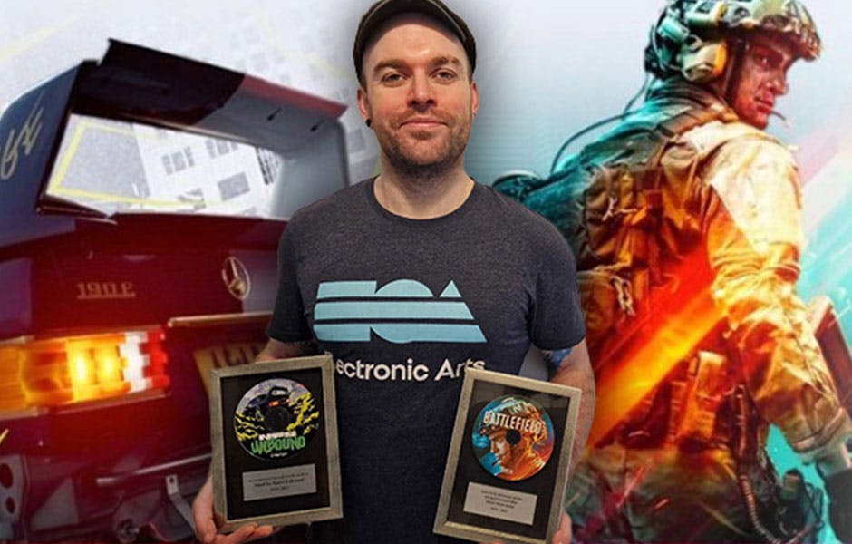 Nathan holding two trophies in front of a background featuring imagery from Unbound and Battlefield