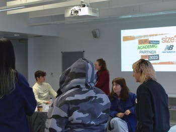 BCU Fashion Branding and Communication Students discussing their campaigns with representatives from Size? and New Balance.