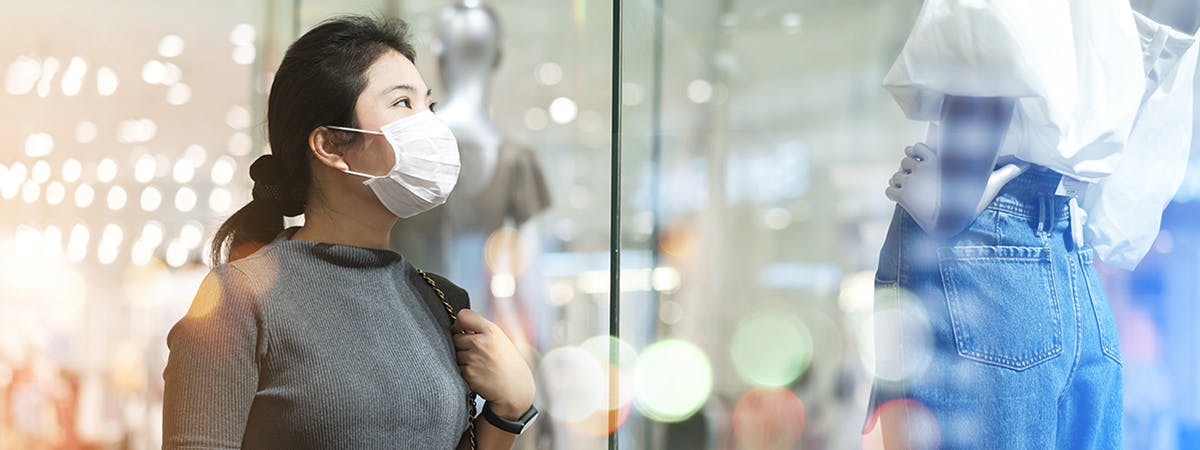 Shopper outside store in facemask