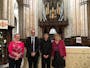 Libby Burgess, Simon Johnson, Godfrey Leung, and Dame Gillian Weir in front of organ in Beverley Minster