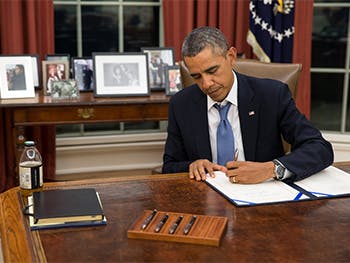 Centre for American Legal Studies Ortiz Page Image 350x263 - Barack Obama signing a document