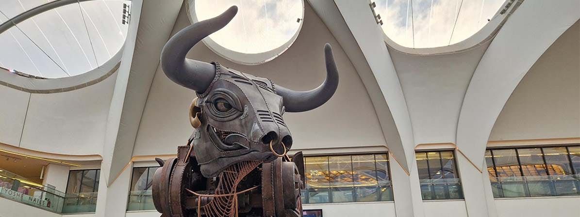 Ozzy the Bull, a large mechanical bull, in New Street station