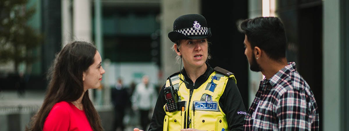 BSc Policing Course Image 1200 x 450 - Two students talking to a police officer
