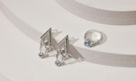 Silver earrings and a ring, both with blue jewels