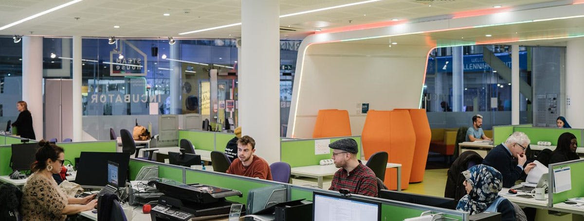 Students and graduates working in STEAMhouse Pre-Incubator, located on the Ground Floor of Millennium Point.
