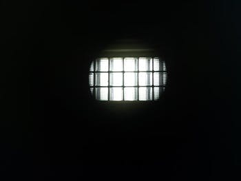 A darkened prison cell
