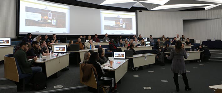 BCU's Hive lecture theatre, with presenter and audience.