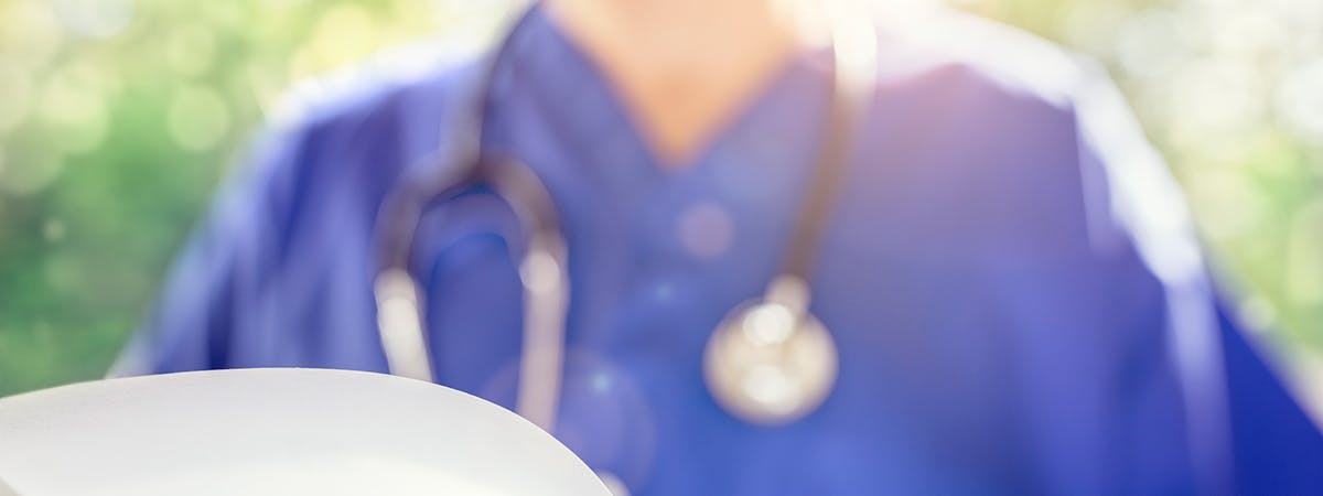 Blurred image of a nurse in uniform