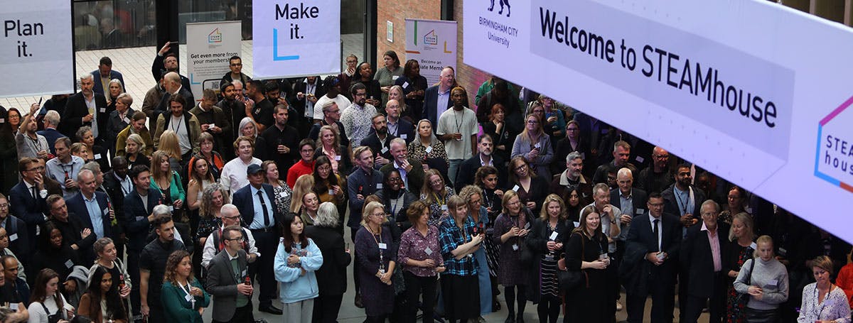 Attendees enjoying the launch of Birmingham City University's STEAMhouse innovation centre.