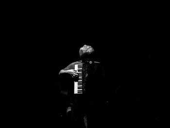 Black and white photo of accordion player