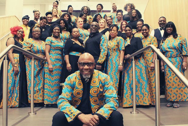 Members of Town Hall Gospel Choir standing on the stairs at Royal Birmingham Conservatoire