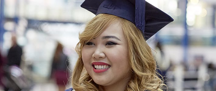 International student at graduation