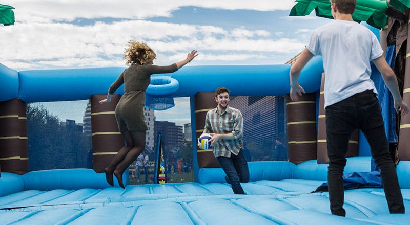 Students on bouncy castle